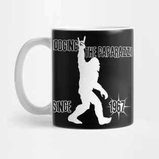 Dodging the Paparazzi Since 1967 (Bigfoot) Mug